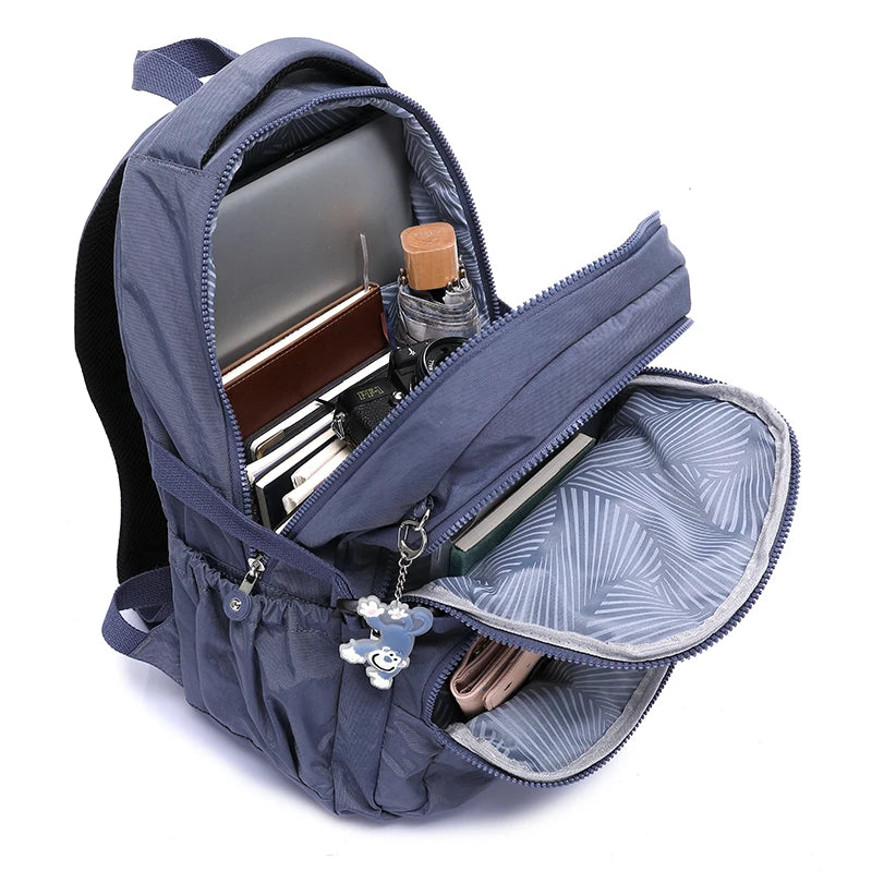 Stylish Waterproof Travel Backpack – Lightweight Large Capacity School & Everyday Bag